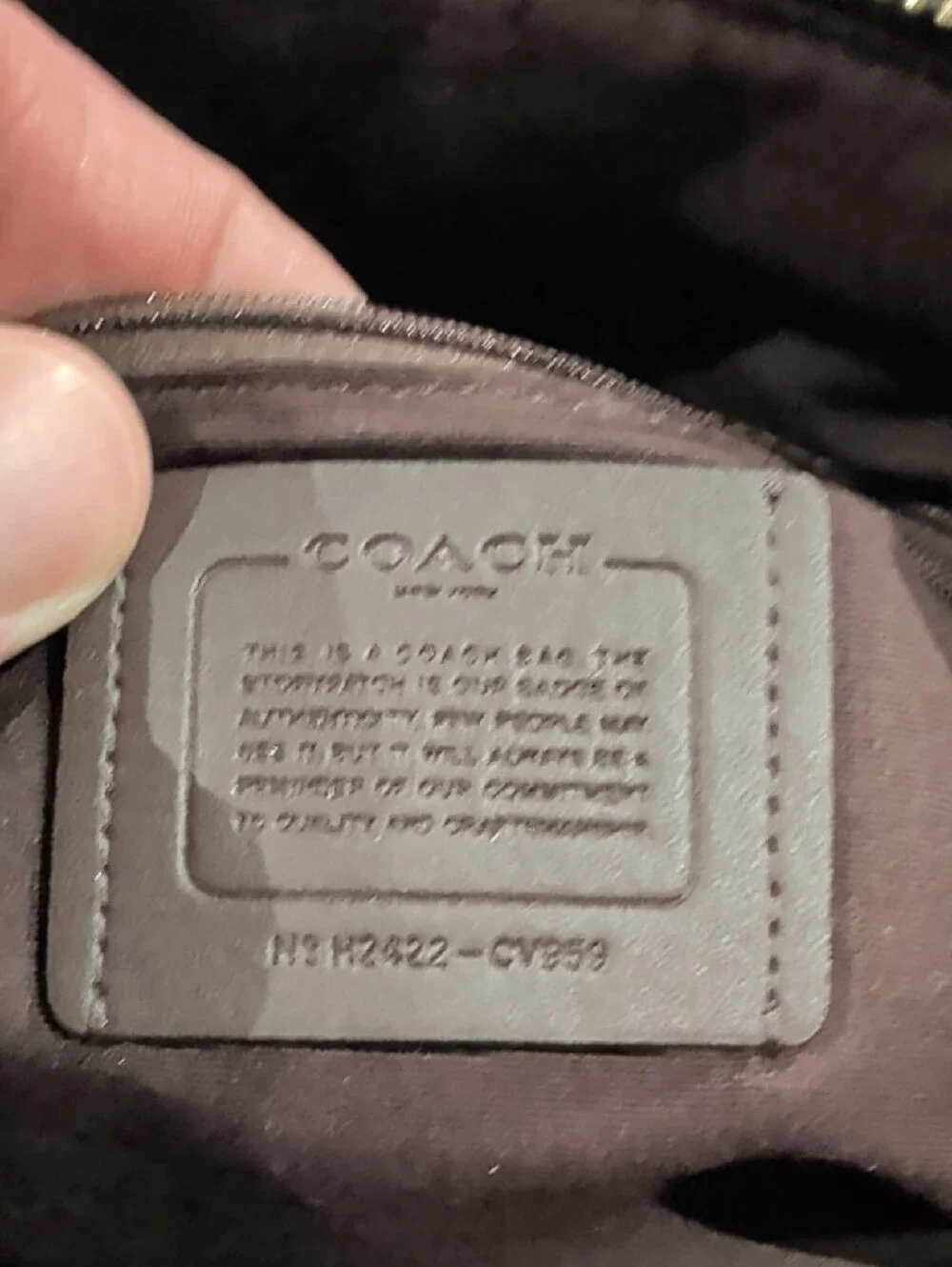 Coach satchel signature